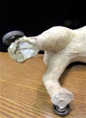 RARE ANTIQUE LATE 1800'S MOLDED CARDBOARD SPOTTED DOG W/GLASS EYES ON WHEELS